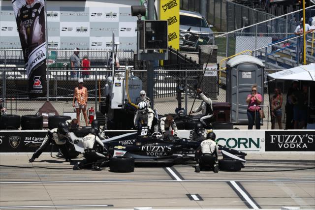 Ed Carpenter comes in for tires and fuel on pit lane during the Iowa Corn 300 at Iowa Speedway -- Photo by: Chris Jones