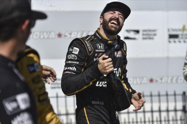 James Hinchcliffe sprays the champagne in Victory Circle after winning the Iowa Corn 300 at Iowa Speedway -- Photo by: Chris Owens