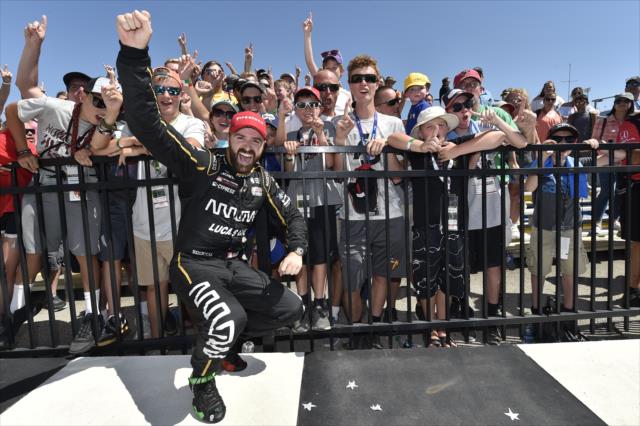 James Hinchcliffe celebrates with the fans in Victory Circle after winning the Iowa Corn 300 at Iowa Speedway -- Photo by: Chris Owens