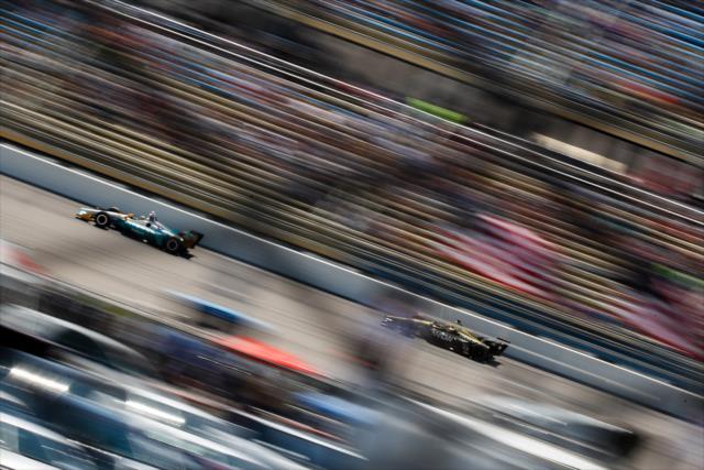 Gabby Chaves and James Hinchcliffe soar down the frontstretch during the Iowa Corn 300 at Iowa Speedway -- Photo by: Joe Skibinski