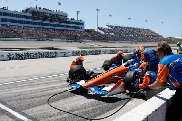 Scott Dixon comes in for tires and fuel on pit lane during the Iowa Corn 300 at Iowa Speedway -- Photo by: Joe Skibinski