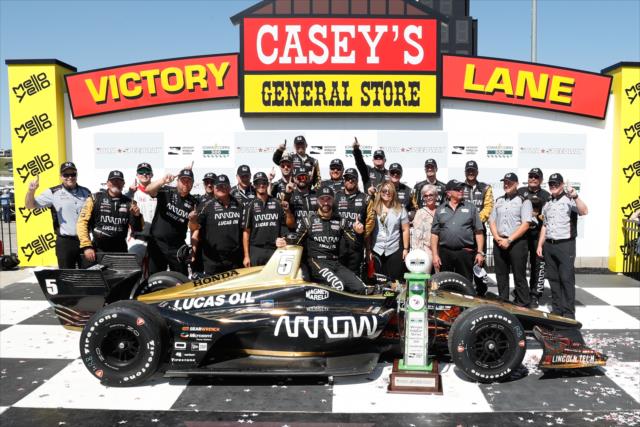 James Hinchcliffe and the Schmidt Peterson Motorsports team in Victory Lane after winning the Iowa Corn 300 at Iowa Speedway -- Photo by: Joe Skibinski