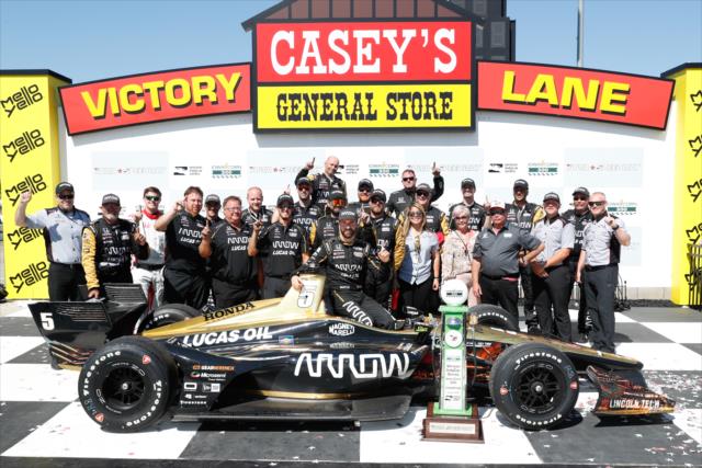 James Hinchcliffe and the Schmidt Peterson Motorsports team in Victory Lane after winning the Iowa Corn 300 at Iowa Speedway -- Photo by: Joe Skibinski