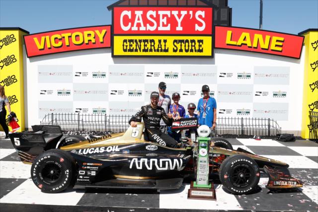James Hinchcliffe with members of INDYCAR Nation in Victory Lane after winning the Iowa Corn 300 at Iowa Speedway -- Photo by: Joe Skibinski