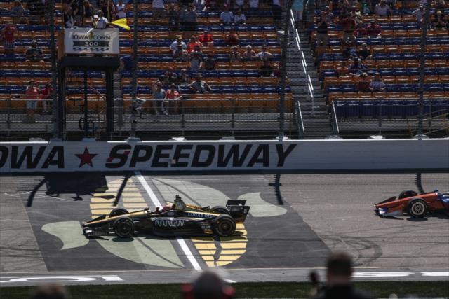 James Hinchcliffe takes the checkered flag to win the Iowa Corn 300 at Iowa Speedway -- Photo by: Shawn Gritzmacher