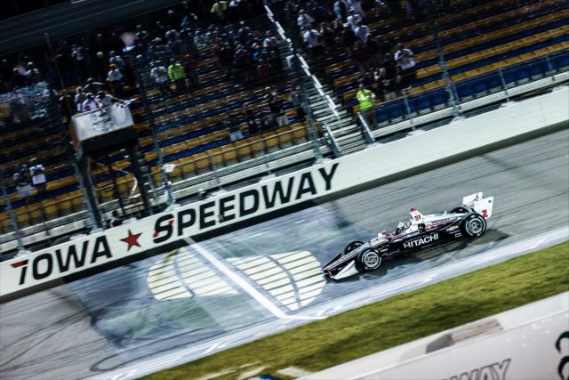 Josef Newgarden taking the checkered flag for the Iowa 300 -- Photo by: Stephen King
