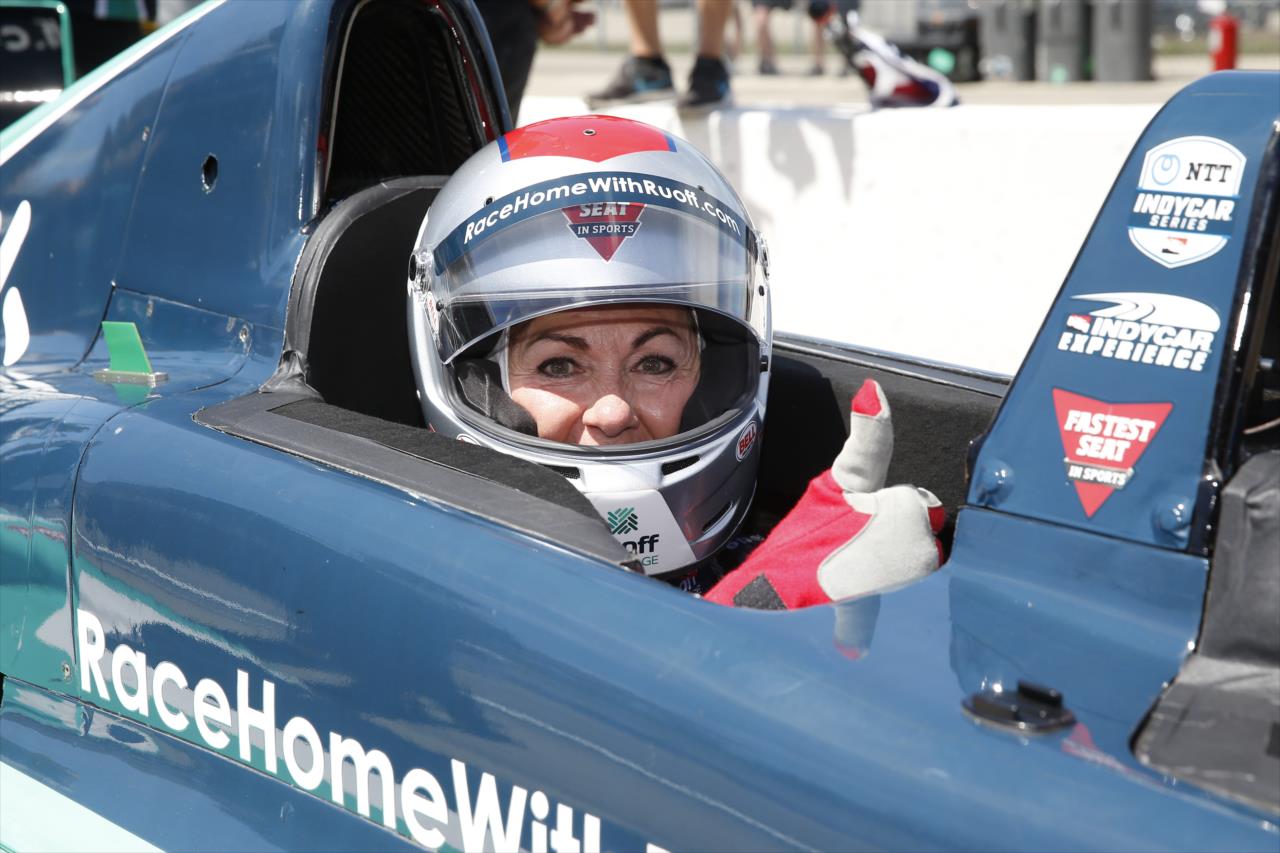 Iowa Governor Kim Reynolds rides in the Ruoff Fastest Seat in Sports with driver Davey Hamilton - Hy-Vee Salute to Farmers 300 - By: Chris Jones -- Photo by: Chris Jones