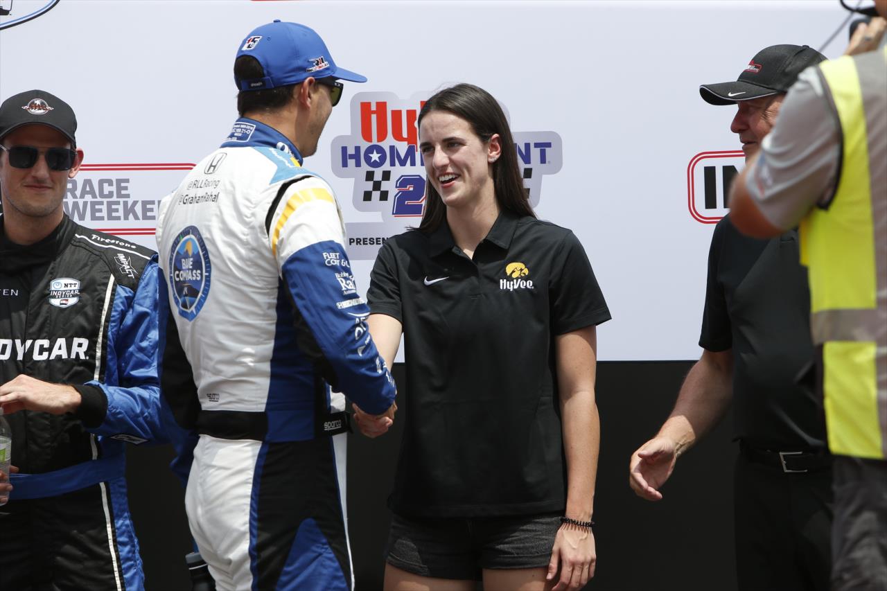 Graham Rahal with Caitlin Clark - Hy-Vee Homefront 250 Presented by Instacart - By: Chris Jones -- Photo by: Chris Jones