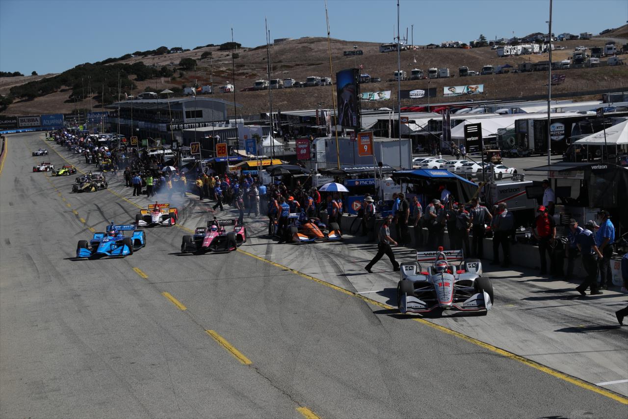 Cars pull out of their pit boxes  -- Photo by: Chris Jones