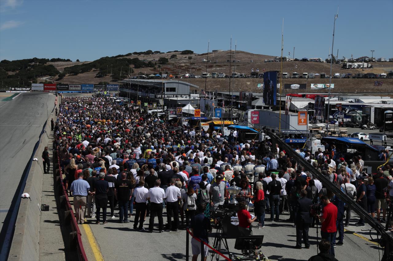 Team members on pit lane prior to the Firestone Grand Prix of Monterey -- Photo by: Chris Jones