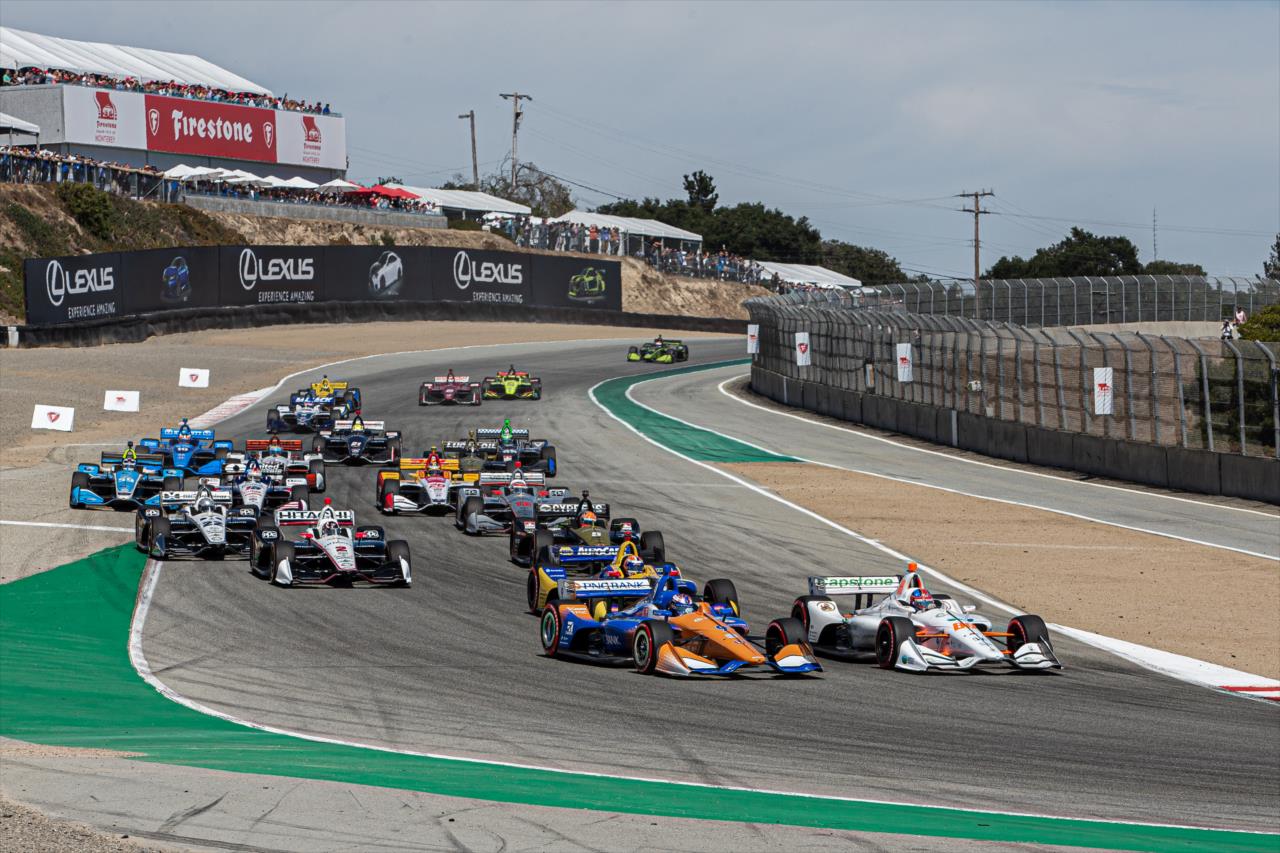 Colton Herta leads the field on the opening lap of the Firestone Grand Prix of Monterey -- Photo by: Stephen King