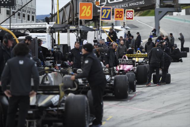 Pit lane comes to life prior to the start of the team test at WeatherTech Raceway Laguna Seca -- Photo by: Chris Owens