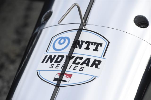 The NTT IndyCar Series logo on display during the team test at WeatherTech Raceway Laguna Seca -- Photo by: Chris Owens