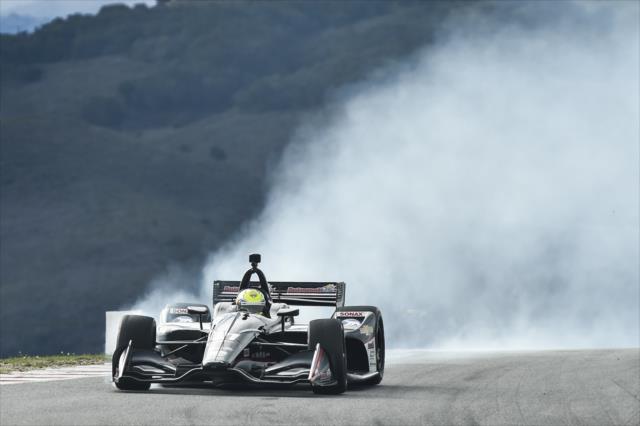 Spencer Pigot lights up his tires setting up for the Corkscrew (Turns 8-8A) during the team test at WeatherTech Raceway Laguna Seca -- Photo by: Chris Owens
