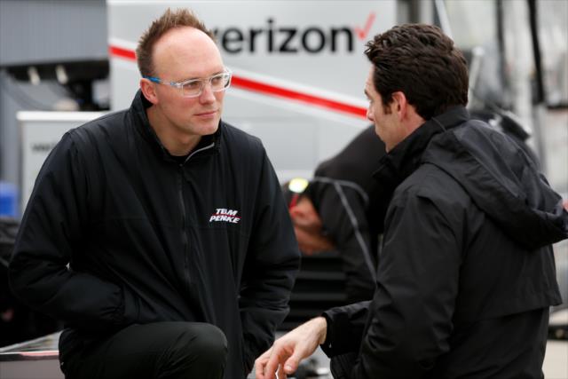 Simon Pagenaud chats with his engineer, Ben Bretzman, on pit lane during the team test at WeatherTech Raceway Laguna Seca -- Photo by: Joe Skibinski