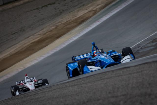 Felix Rosenqvist and Josef Newgarden race out of the Rainey Curve (Turn 9) during the team test at WeatherTech Raceway Laguna Seca -- Photo by: Stephen King