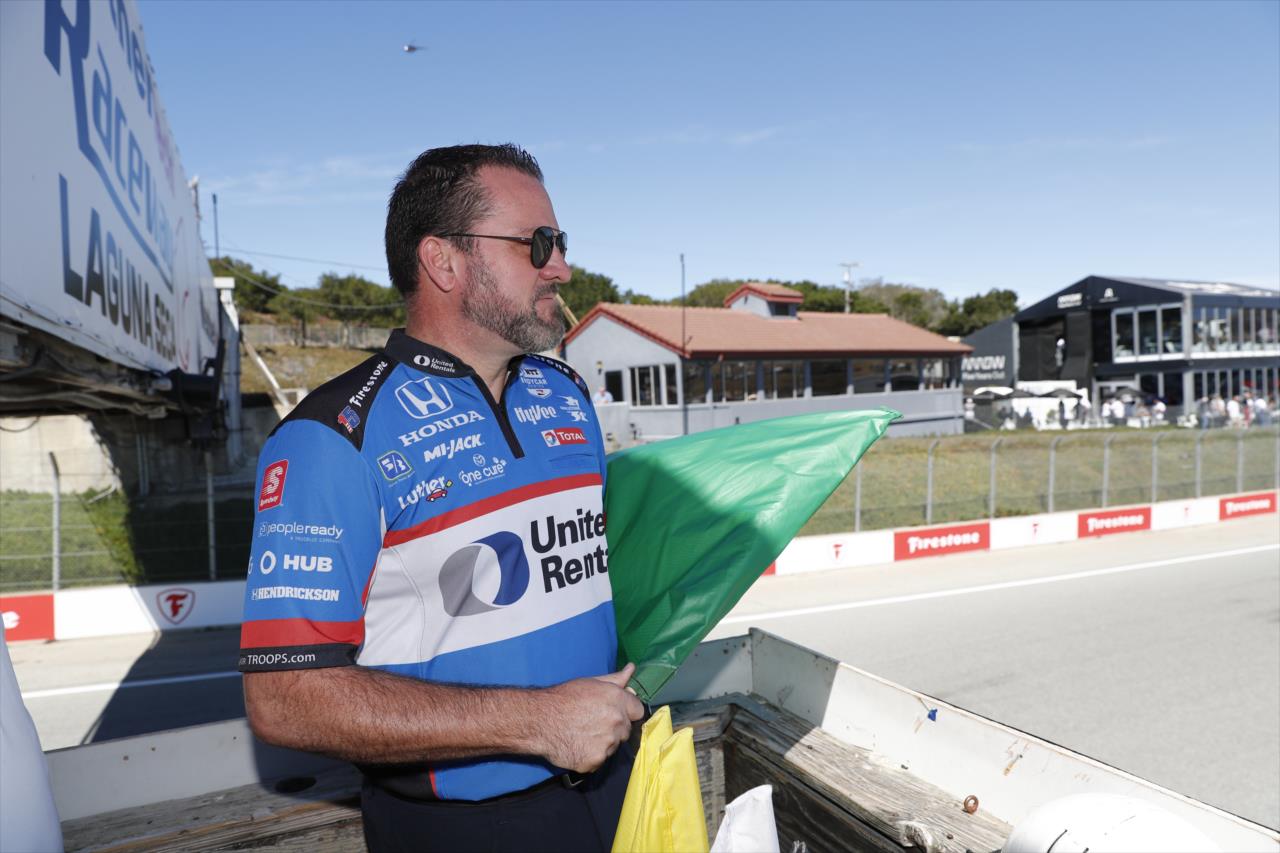 Green flag waved by United Rentals' Jeremy Fountain - Firestone Grand Prix of Monterey -- Photo by: Chris Jones