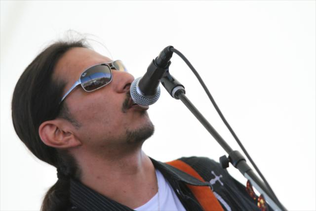Los Lonely Boys perform before the race -- Photo by: Shawn Gritzmacher
