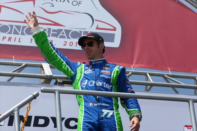 Simon Pagenaud waives to the crowd during pre-race festivities -- Photo by: Chris Jones