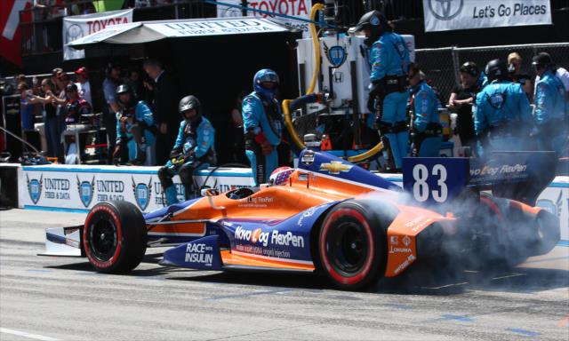 Charlie Kimball screams out of his pit stall during the race -- Photo by: Chris Jones