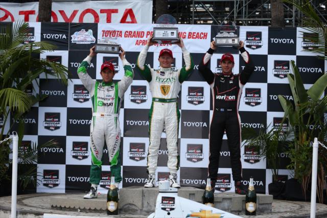 The podium hoist their trophies following the Toyota Grand Prix of Long Beach -- Photo by: Chris Jones