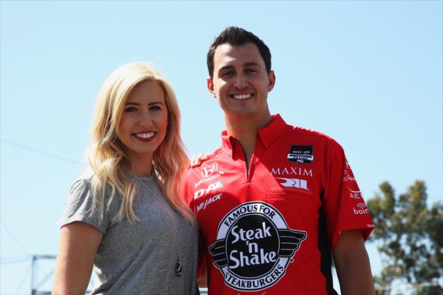 Graham Rahal and his fiance, Courtney Force, in the paddock prior to practice for the Toyota Grand Prix of Long Beach -- Photo by: Chris Jones