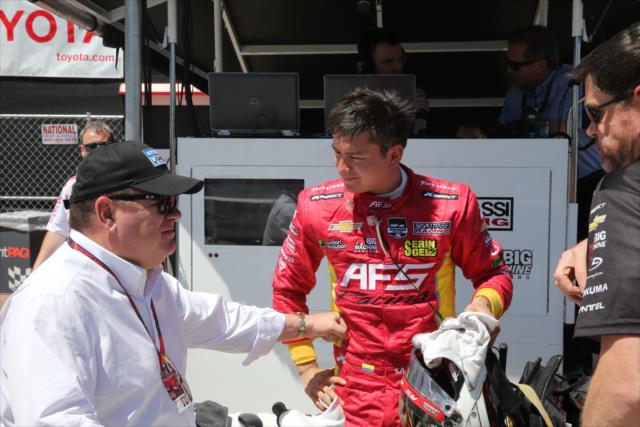 Sebastian Saavedra chats with Team Owner Chip Ganassi in pit lane prior to practice for the Toyota Grand Prix of Long Beach -- Photo by: Chris Jones