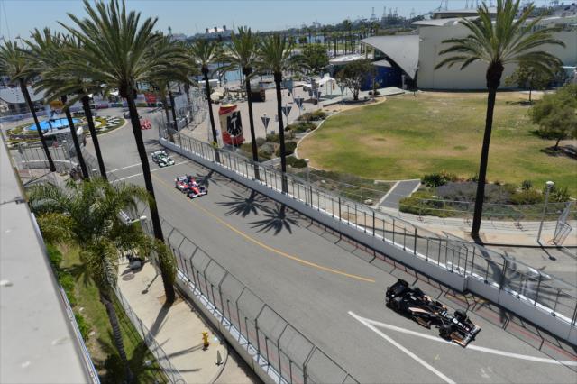 Josef Newgarden leads a group of cars toward Turn 5 during practice for the Toyota Grand Prix of Long Beach -- Photo by: Chris Owens