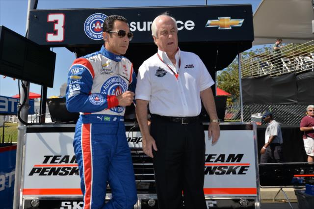 Helio Castroneves and team owner Roger Penske chat on pit lane prior to practice for the Toyota Grand Prix of Long Beach -- Photo by: Chris Owens