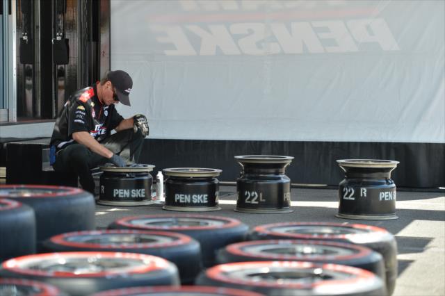 A Team Penske crewman prepares wheel rims for Sunday's Toyota Grand Prix of Long Beach -- Photo by: Chris Owens