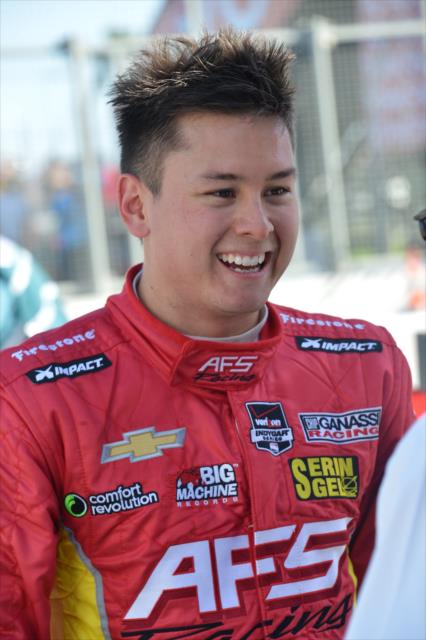 Sebastian Saavedra in his pit stand following practice for the Toyota Grand Prix of Long Beach -- Photo by: Chris Owens