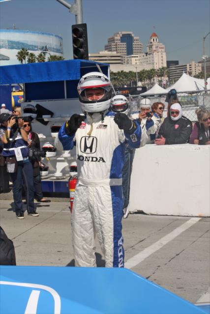 Actor Dax Sheppard prepares to take a two-seater ride at the Toyota Grand Prix of Long Beach -- Photo by: Richard Dowdy