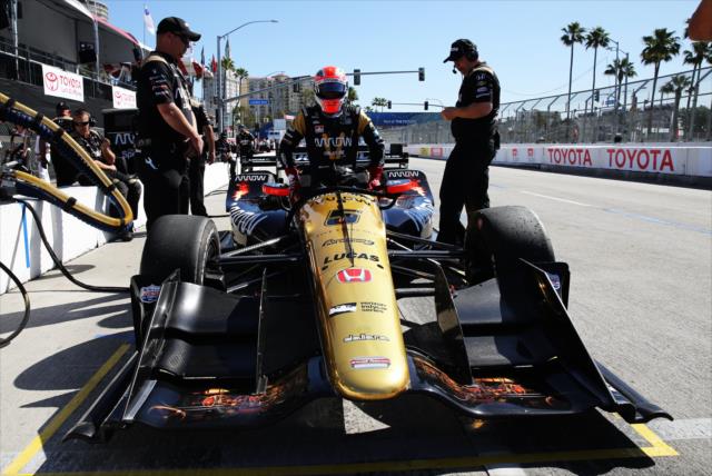 James Hinchcliffe slides into his No. 5 Arrow Honda prior to practice for the Toyota Grand Prix of Long Beach -- Photo by: Chris Jones