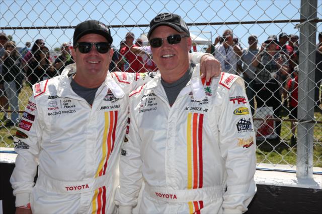 Indy car legends Al Unser Jr. and Jimmy Vasser pose for a photo during pre-race festivities for the Toyota Celebrity Pro-Am Race on the Streets of Long Beach -- Photo by: Chris Jones