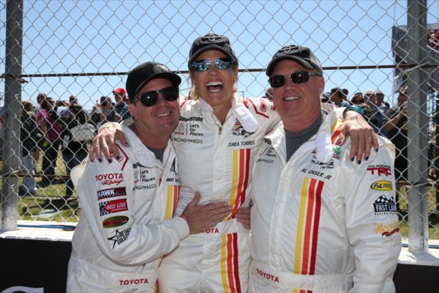 Jimmy Vasser and Al Unser Jr. pose with Olympian great Dara Torres during pre-race festivities for the Toyota Celebrity Pro-Am Race on the Streets of Long Beach -- Photo by: Chris Jones