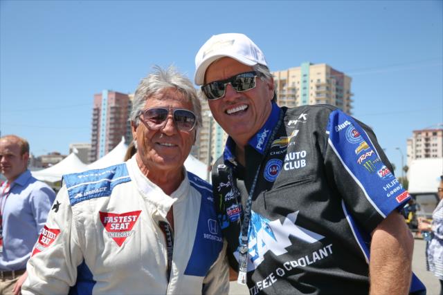Racing legends Mario Andretti and John Force pose for a photo in Long Beach -- Photo by: Chris Jones