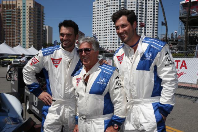 Maksim Chmerkovsky and Tony Dovolani from Dancing With the Stars pose with Mario Andretti prior to their two-seater ride on the Streets of Long Beach -- Photo by: Chris Jones