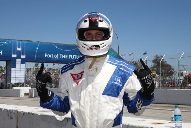 Maksim Chmerkovsky following his two-seater ride with Mario Andretti on the Streets of Long Beach -- Photo by: Chris Jones