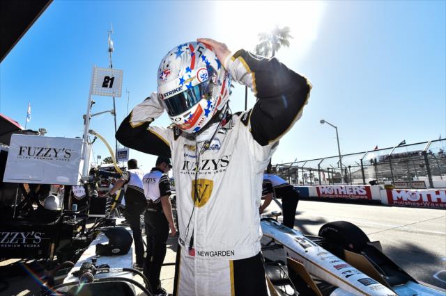 Josef Newgarden straps his helmet on prior to qualifications for the Toyota Grand Prix of Long Beach -- Photo by: Chris Owens