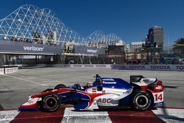 Takuma Sato dives into Turn 1 during practice for the Toyota Grand Prix of Long Beach -- Photo by: Chris Owens