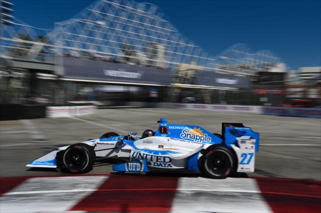 Marco Andretti dives into Turn 1 during practice for the Toyota Grand Prix of Long Beach -- Photo by: Chris Owens
