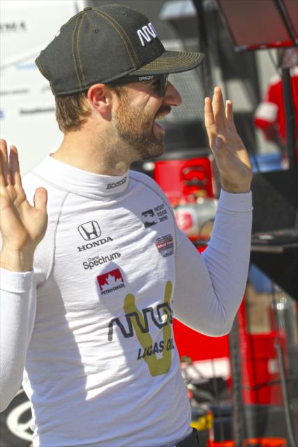 James Hinchcliffe chats along pit lane prior to practice for the Toyota Grand Prix of Long Beach -- Photo by: Richard Dowdy