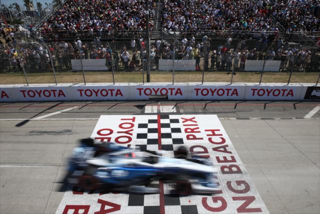 Max Chilton flashes across the start-finish line during the Toyota Grand Prix of Long Beach -- Photo by: Chris Jones