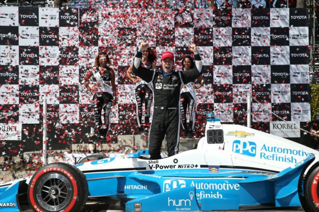 Simon Pagenaud celebrates in Victory Circle after winning the Toyota Grand Prix of Long Beach -- Photo by: Chris Jones