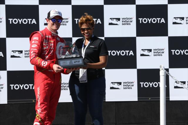 Scott Dixon accepts his 2nd Place trophy in Victory Circle following the Toyota Grand Prix of Long Beach -- Photo by: Chris Jones