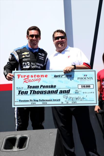 Simon Pagenaud accepts the Firestone Pit Stop Performance award on behalf of Team Penske for their pit stop performance in Phoenix -- Photo by: Chris Jones