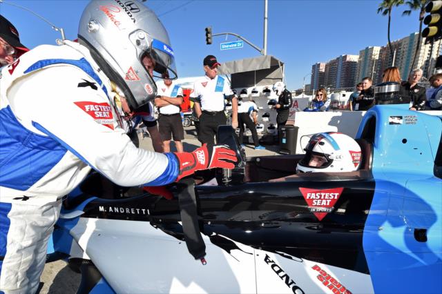 Spike Feresten and Topher Grace prep for their two-seater ride prior to the Toyota Grand Prix of Long Beach -- Photo by: Chris Owens