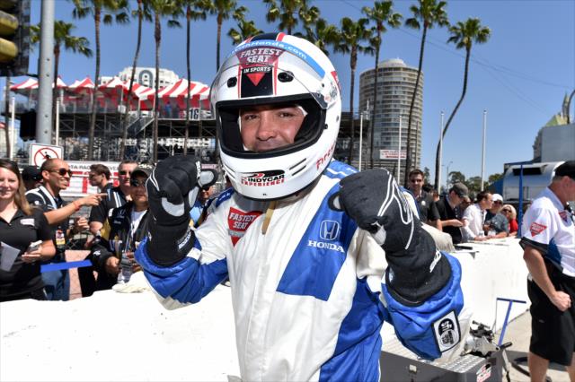 Oscar De La Hoya is geared up prior to his two-seater ride with Mario Andretti on the Streets of Long Beach -- Photo by: Chris Owens