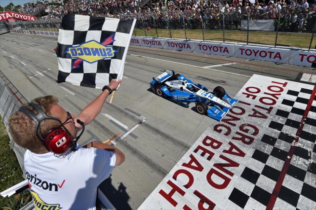 Simon Pagenaud takes the twin checkers to win the 2016 Toyota Grand Prix of Long Beach -- Photo by: Chris Owens