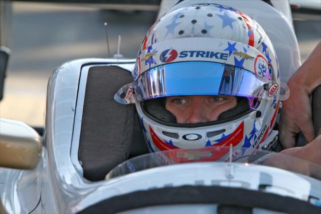 Josef Newgarden gets strapped into his No. 21 Fuzzy's Vodka Chevrolet prior to the final warmup for the Toyota Grand Prix of Long Beach -- Photo by: Richard Dowdy
